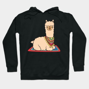 A alpaca sleeping on a carpet. Hoodie